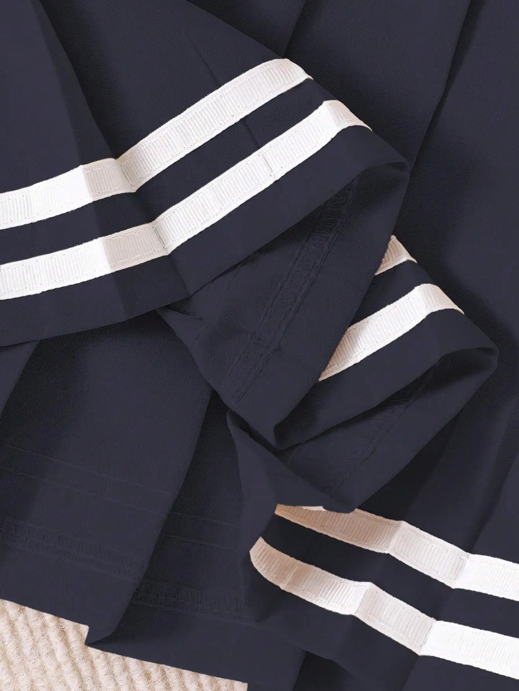 Navy Blue Pleated Skirt for Girls with White Stripe Trim and Elastic Waist