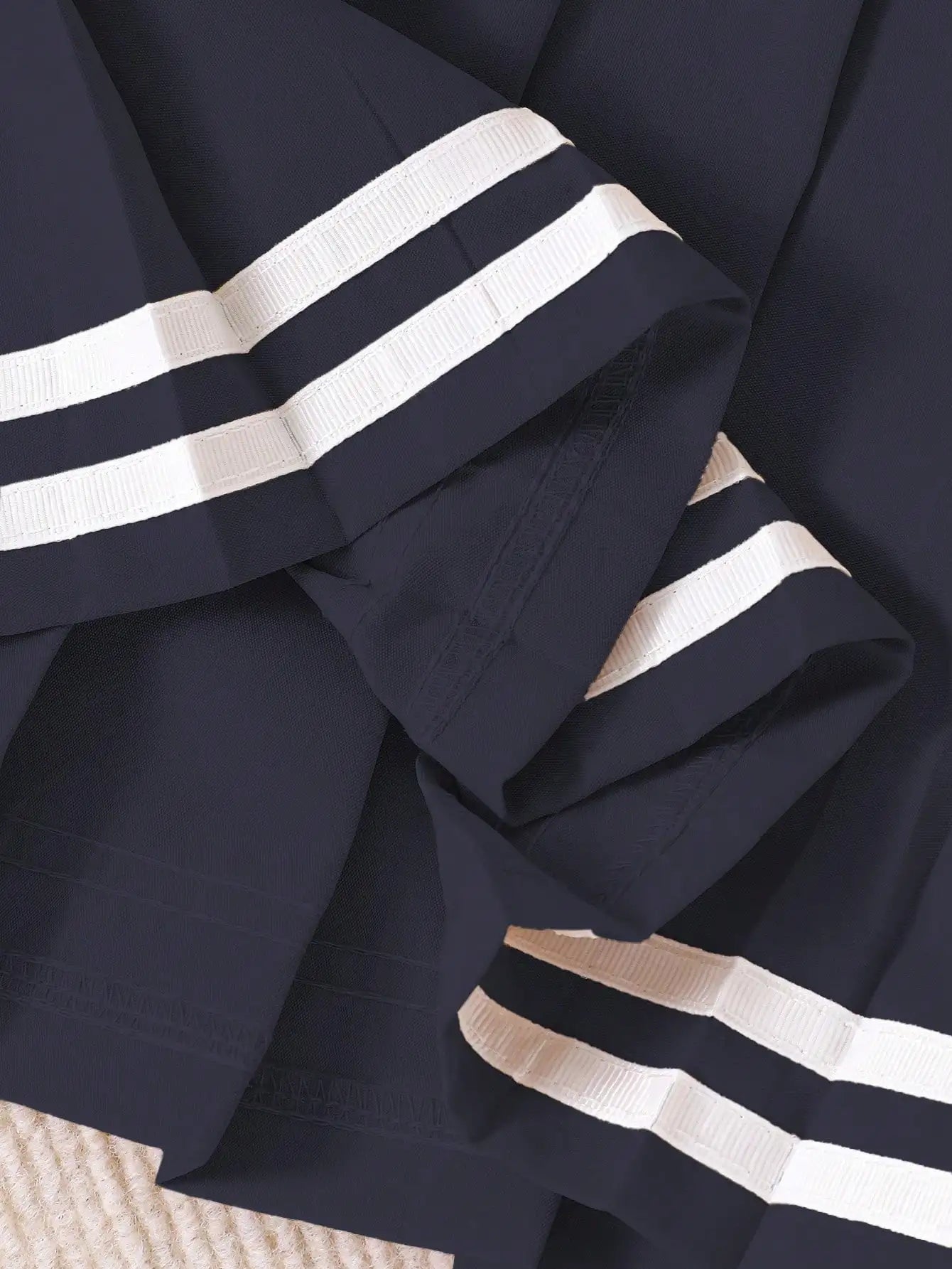 Navy Blue Pleated Skirt for Girls with White Stripe Trim and Elastic Waist